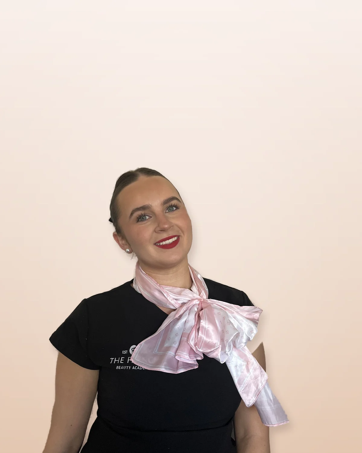 Emma Maden, makeup and bridal artist and aspiring skin therapist, in her French Beauty Academy uniform